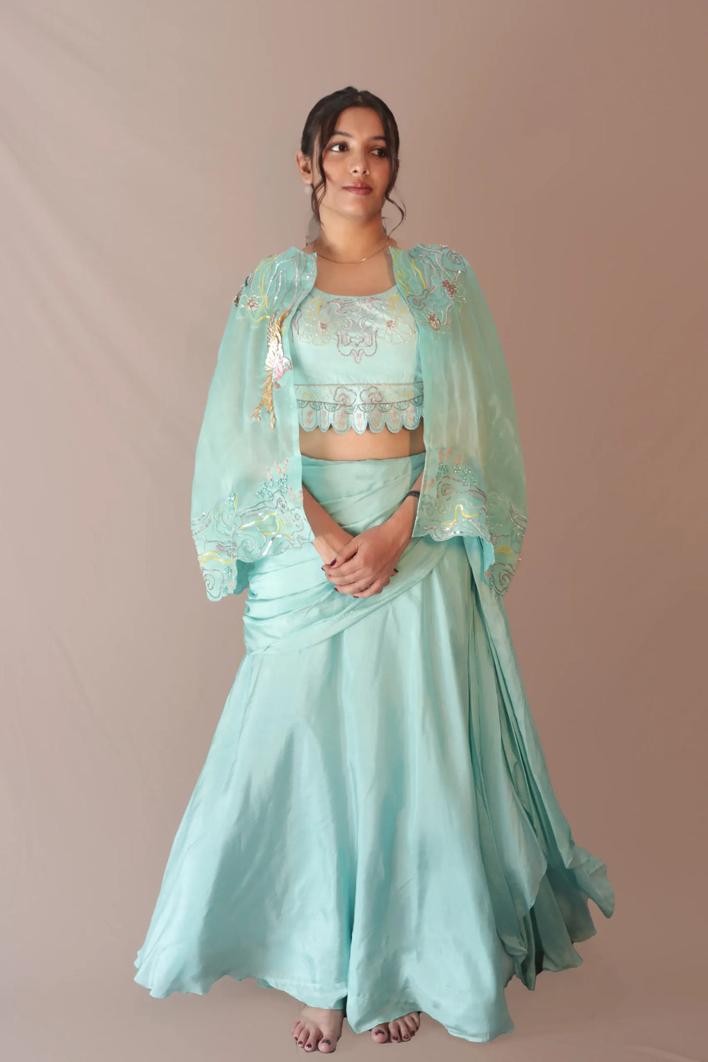Bird cape with bustier and draped skirt