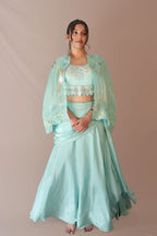 Bird cape with bustier and draped skirt