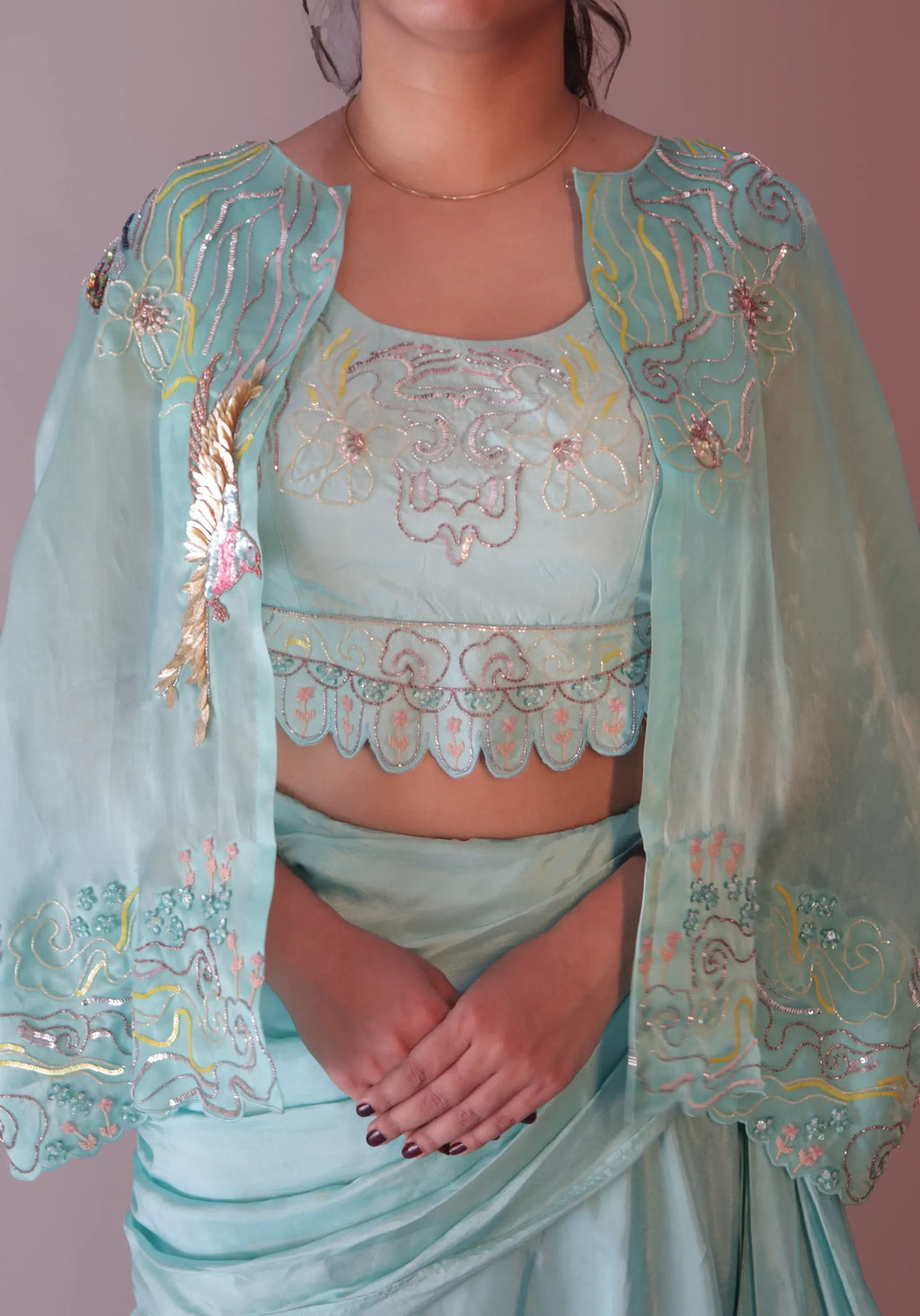 Bird cape with bustier and draped skirt