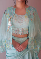 Bird cape with bustier and draped skirt