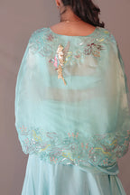 Bird cape with bustier and draped skirt
