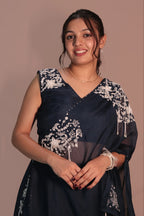 One shoulder cape with flared pants