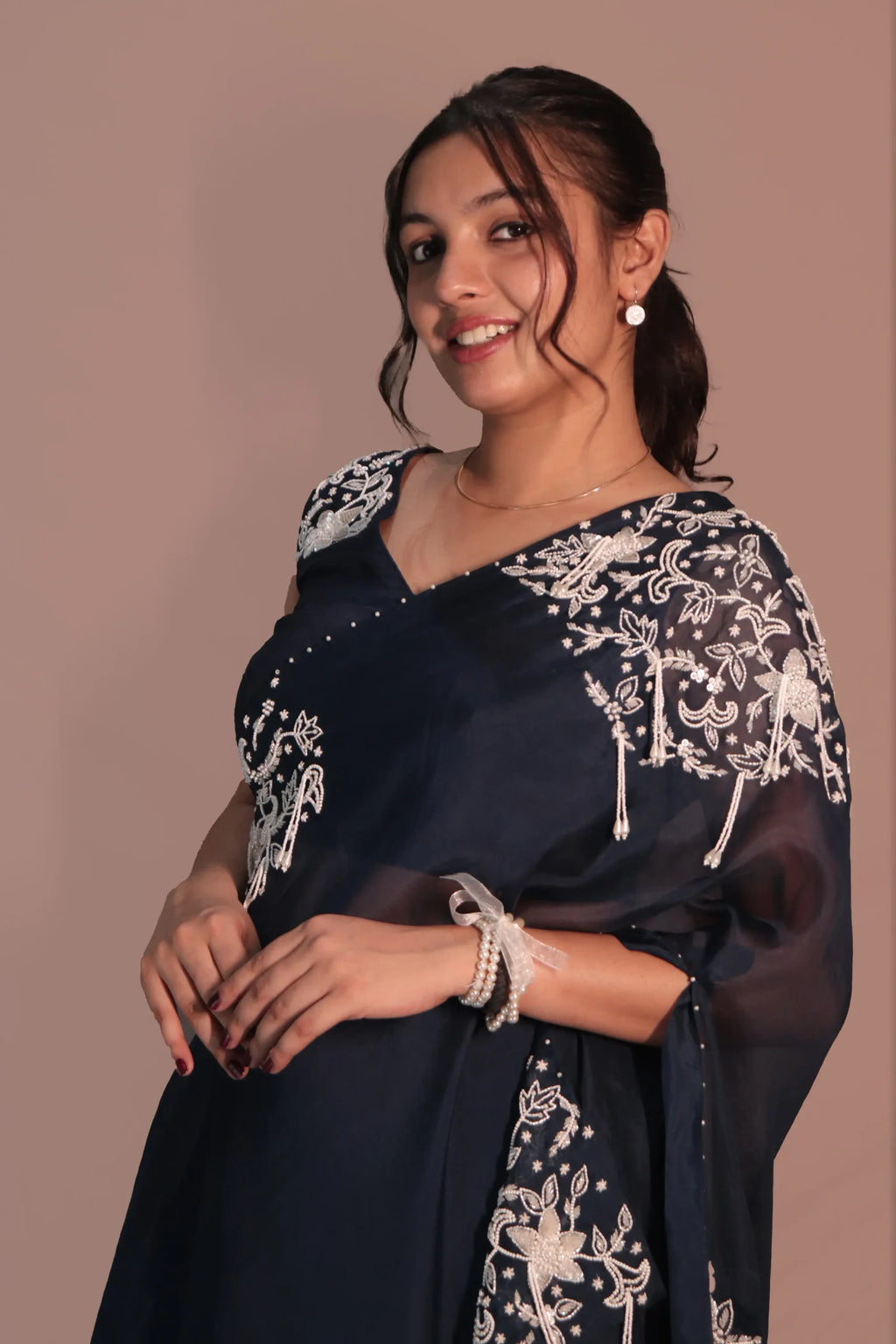 One shoulder cape with flared pants