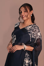 One shoulder cape with flared pants