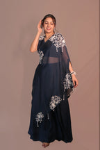 One shoulder cape with flared pants