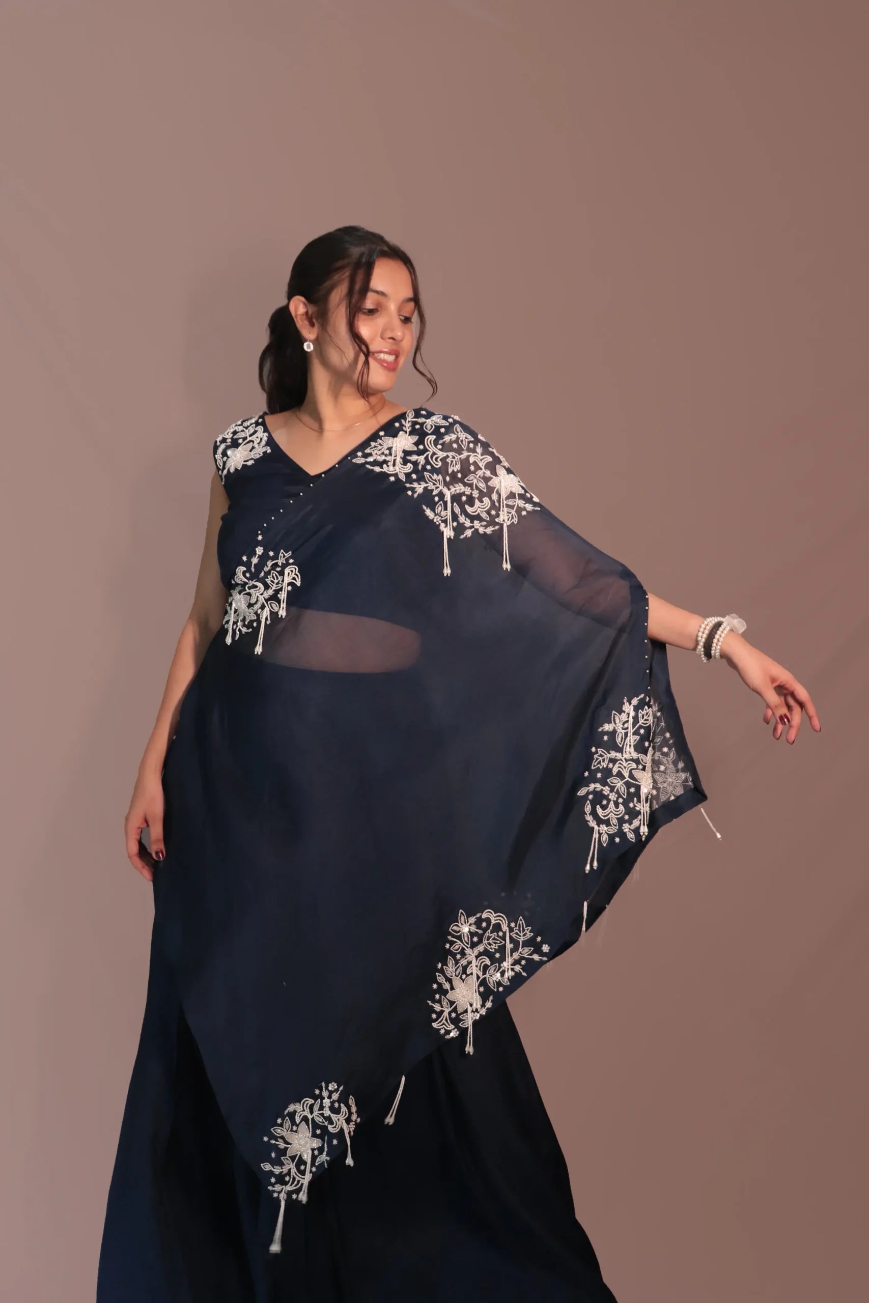 One shoulder cape with flared pants