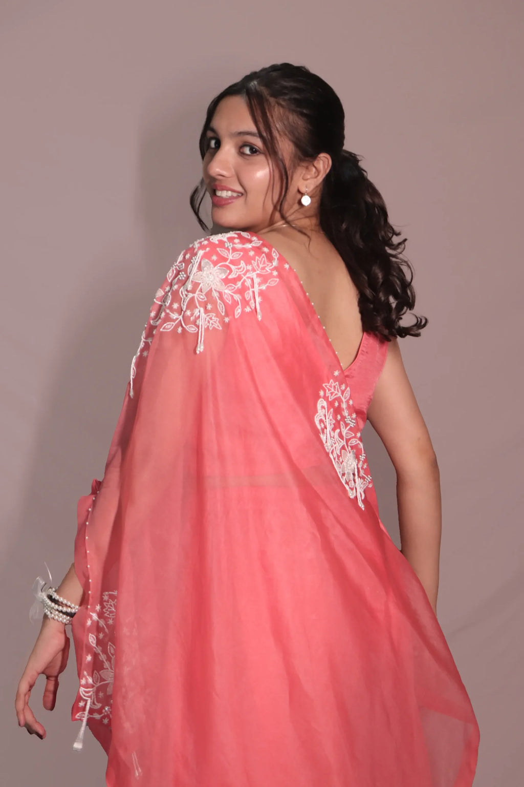 One shoulder cape with flared pants
