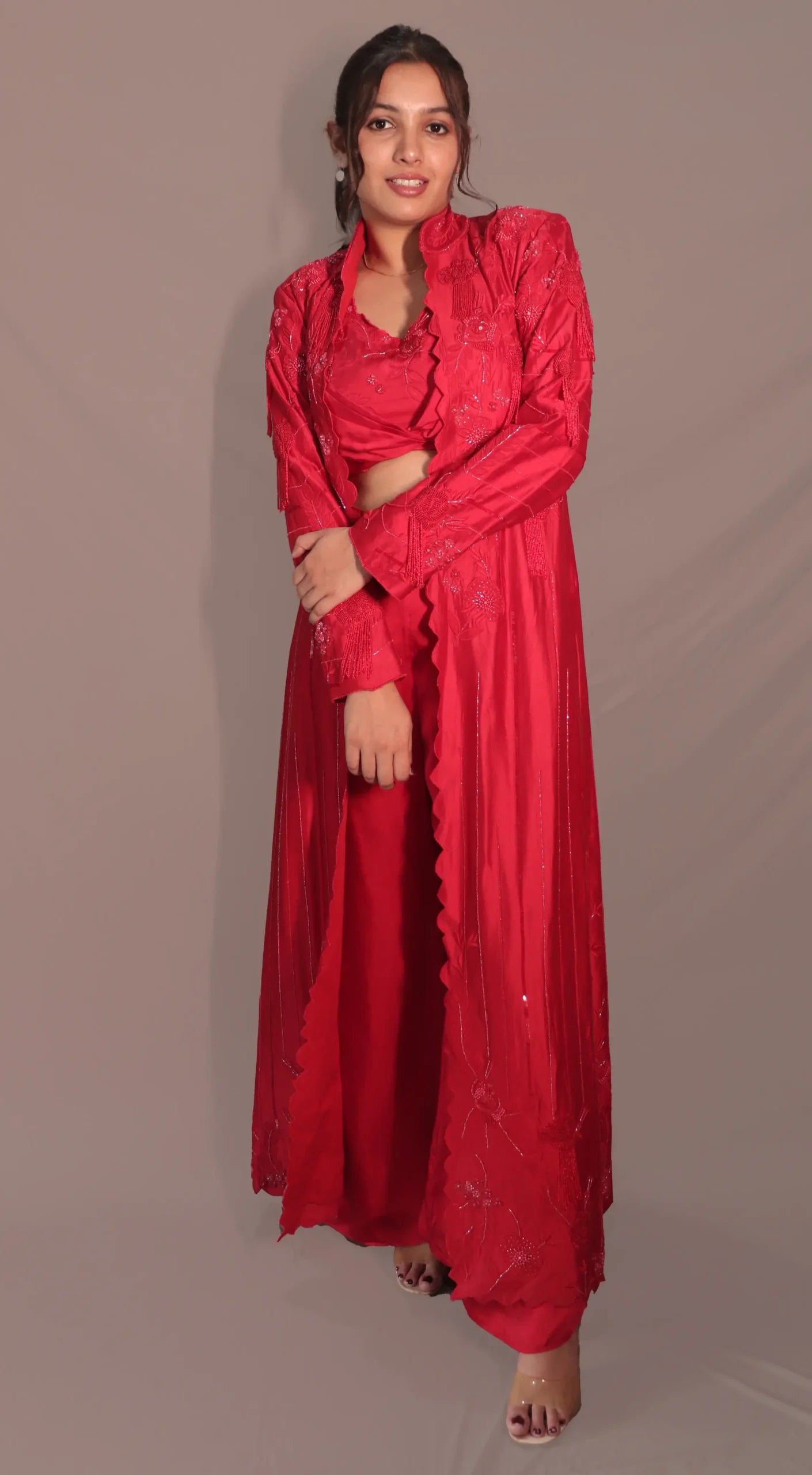 Long jacket with flared pants and bustier