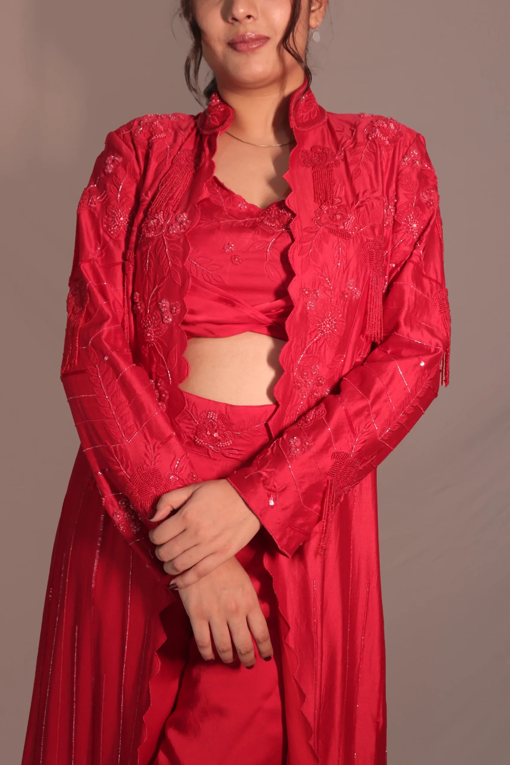 Long jacket with flared pants and bustier