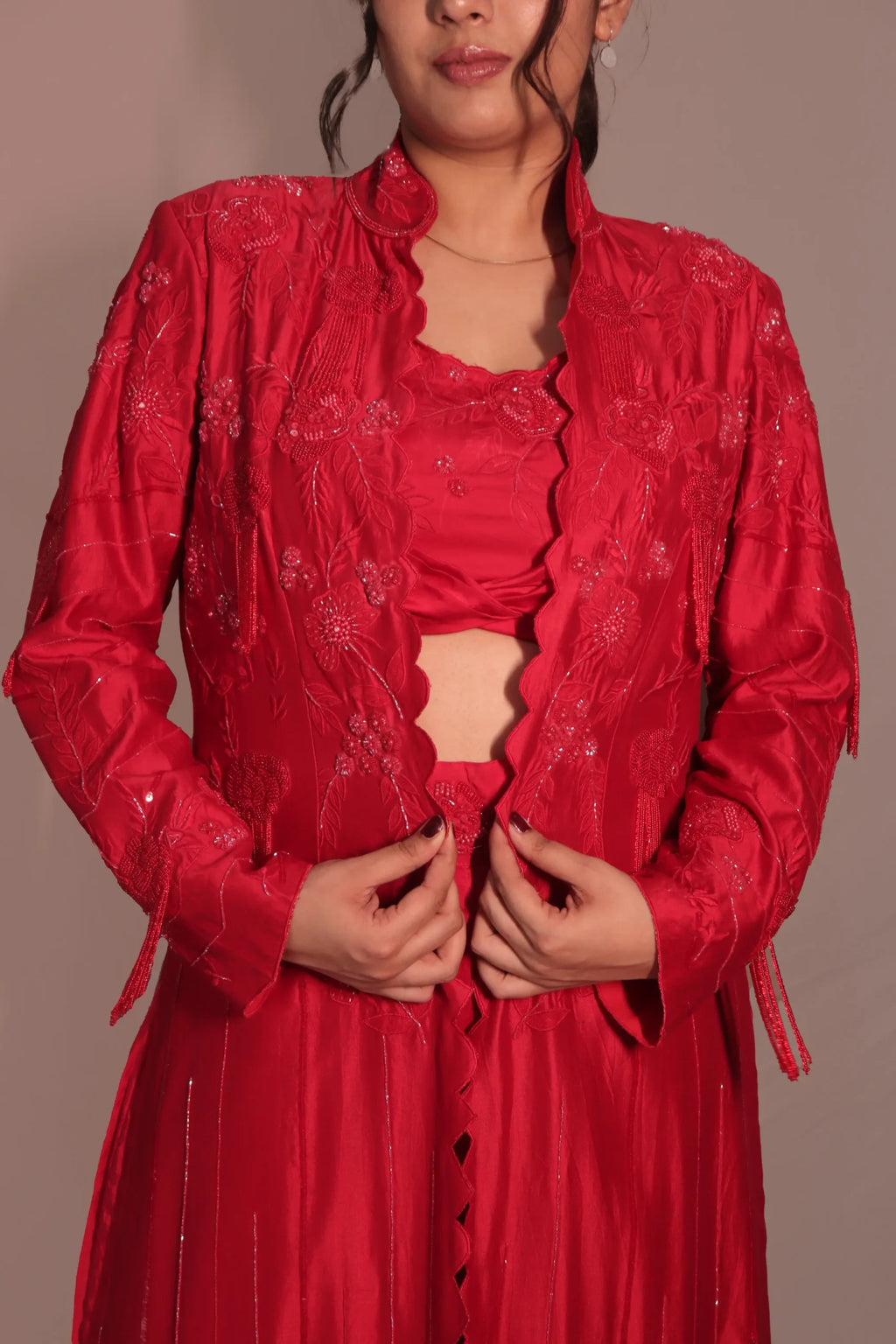 Long jacket with flared pants and bustier