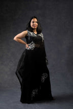 One shoulder cape with flared pants