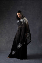 One shoulder cape with flared pants
