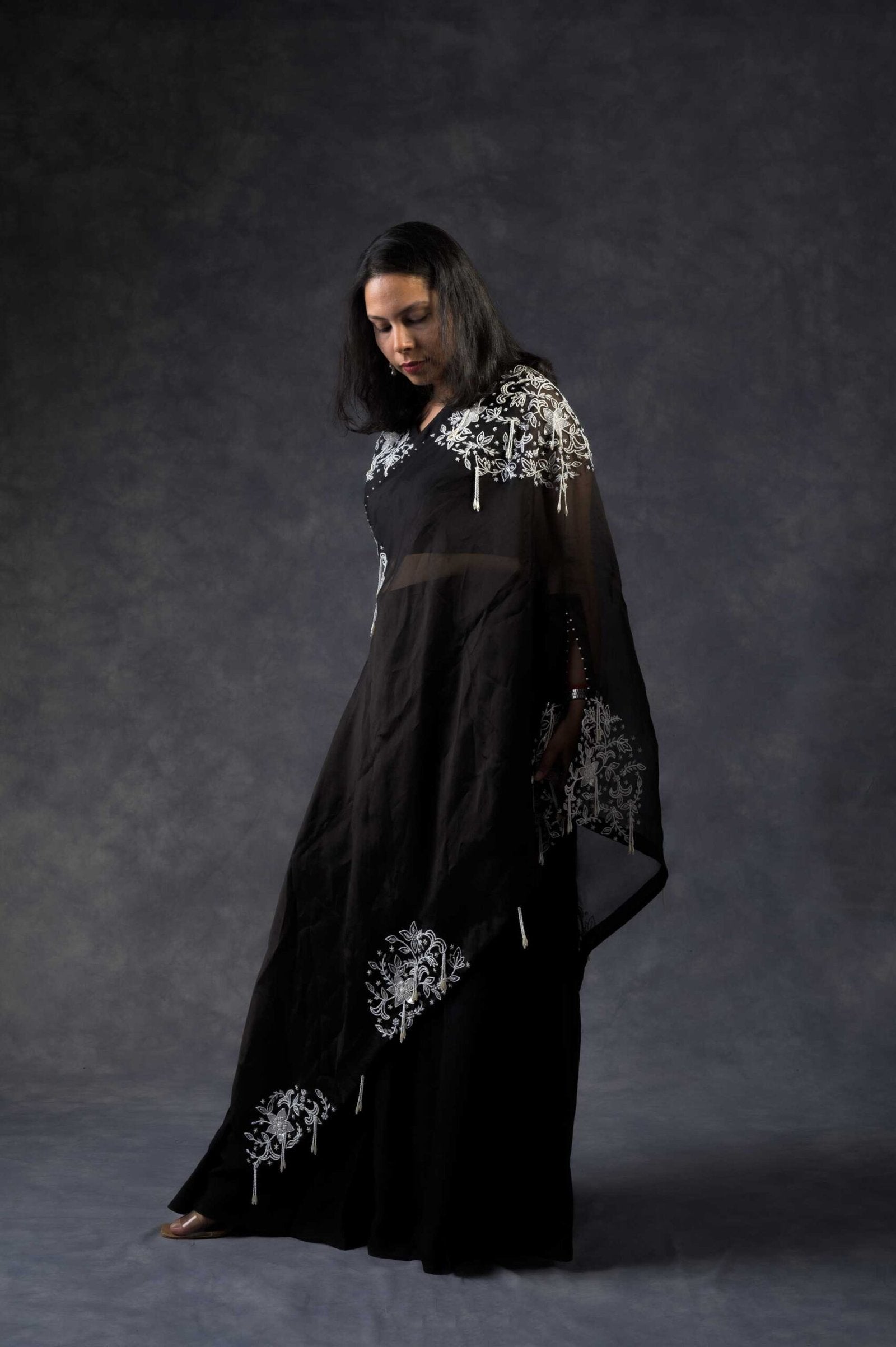One shoulder cape with flared pants