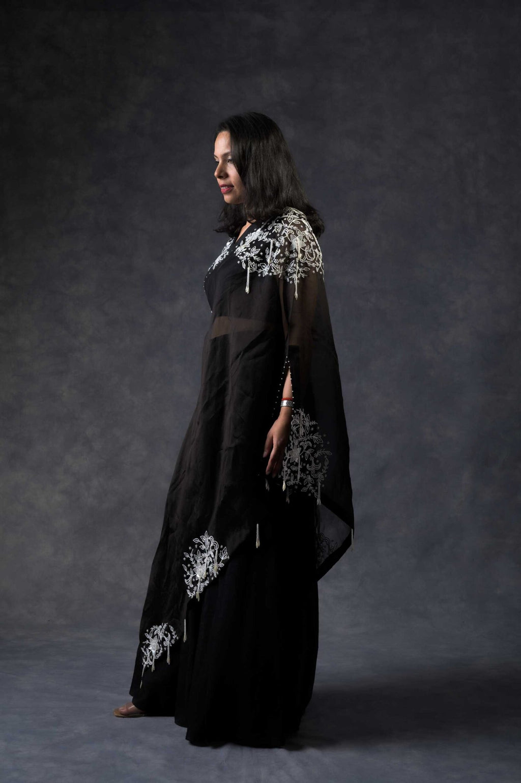 One shoulder cape with flared pants