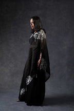 One shoulder cape with flared pants