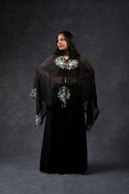 One shoulder cape with flared pants