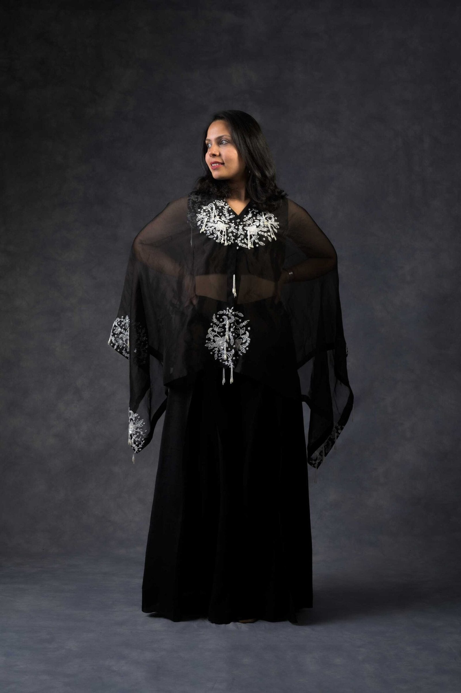 One shoulder cape with flared pants