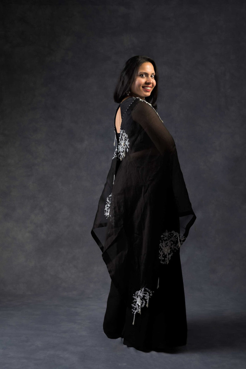 One shoulder cape with flared pants
